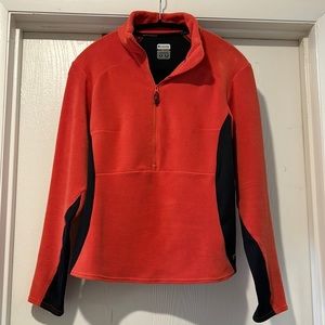 Ladies fleece pullover with zipper on front. Orange and Black